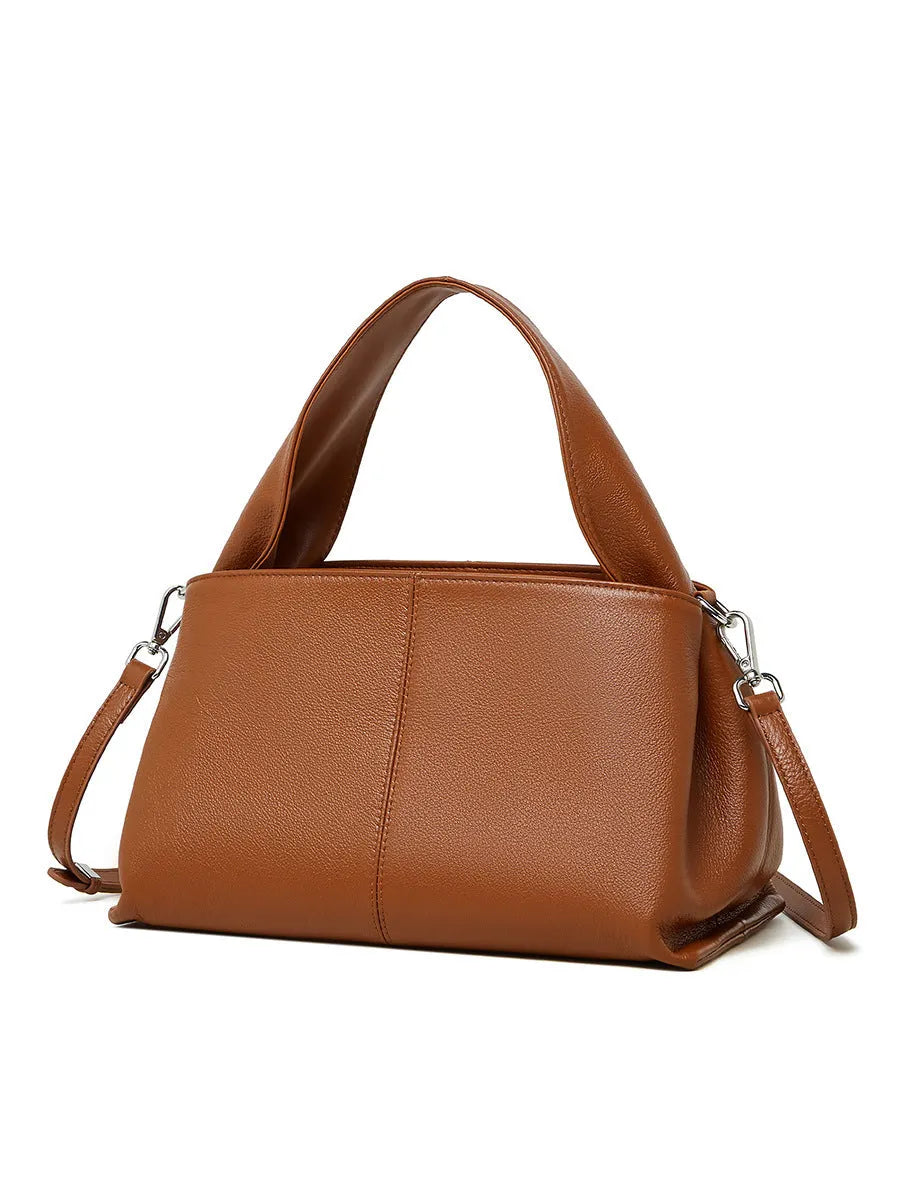 Genuine cowhide messenger bag in horizontal square shape with double shoulder straps and retro texture