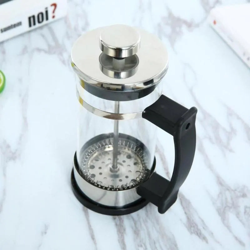 Glass and stainless steel manual coffee maker measuring 10cm wide, 8cm deep, 17cm tall with 350ml capacity.