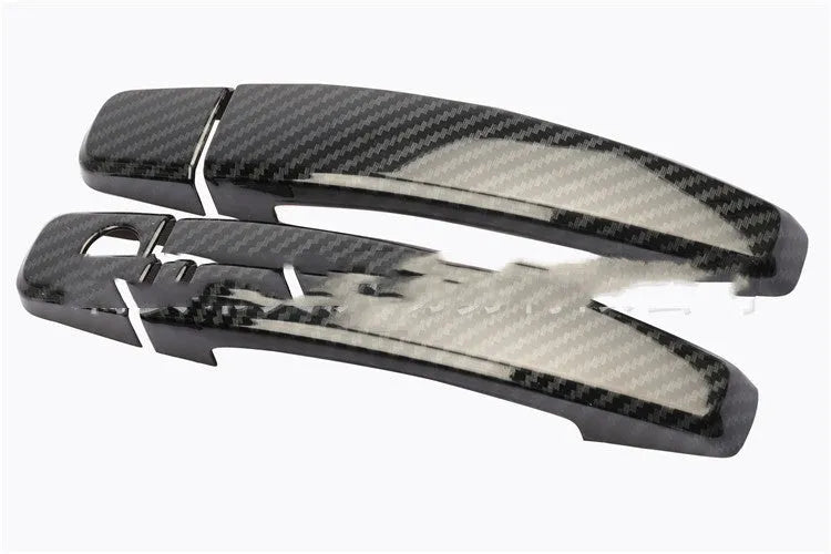 Carbon fibre pattern door handle trim for Opel Vauxhall Astra vehicles