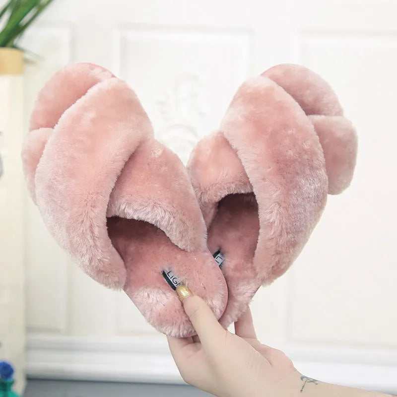 Cross open-toe fur slippers in multiple colours showing patterned sole and anatomical heel.