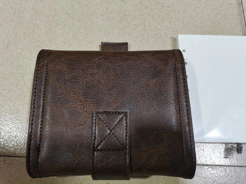 Brown retro-style notebook with leather buckle on PU cover, showing loose-leaf binder binding and A7 size
