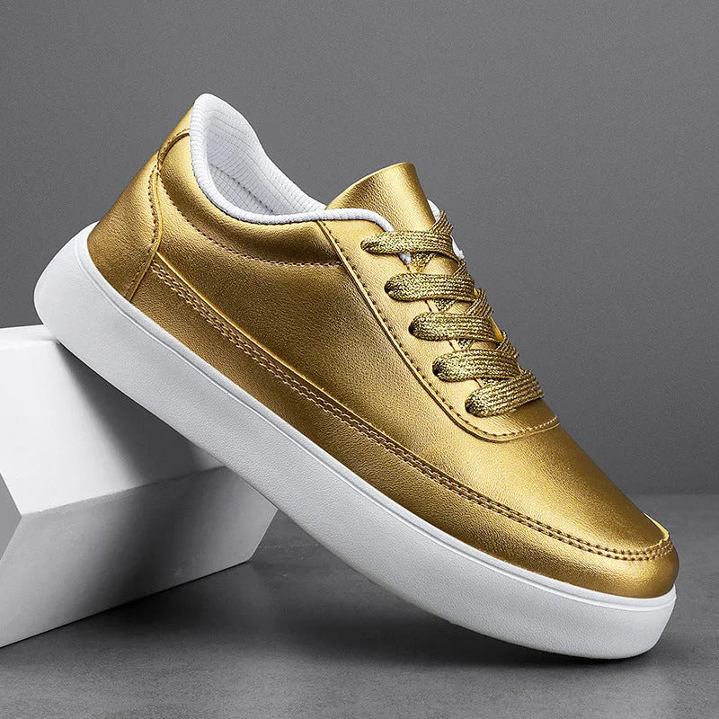 Women's white leather lace-up flat casual shoes on a neutral background.