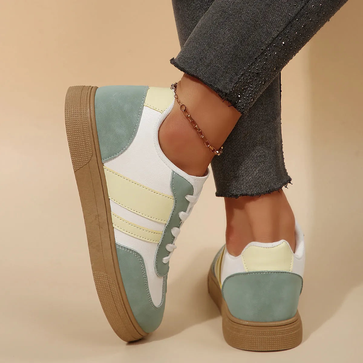 Green retro sports women's pumps with cross-strap design and round toe