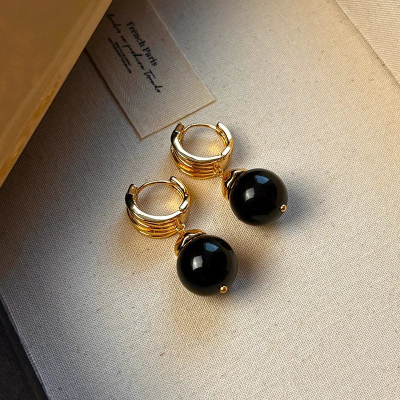 Geometric Tigereye stone earrings for women with gold plating in brown and black colour options.