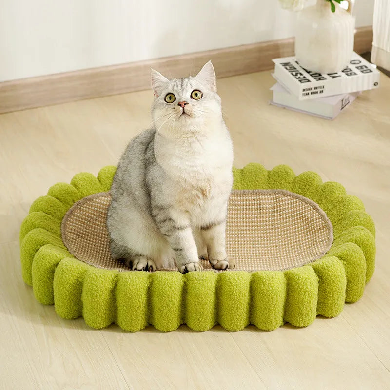 Green oval sisal cat scratch pad bowl measuring 650mm functioning as cat scratcher and bed
