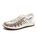 Woven drawstring Roman sandals in a rainbow colour with an elastic fastening and rubber sole.