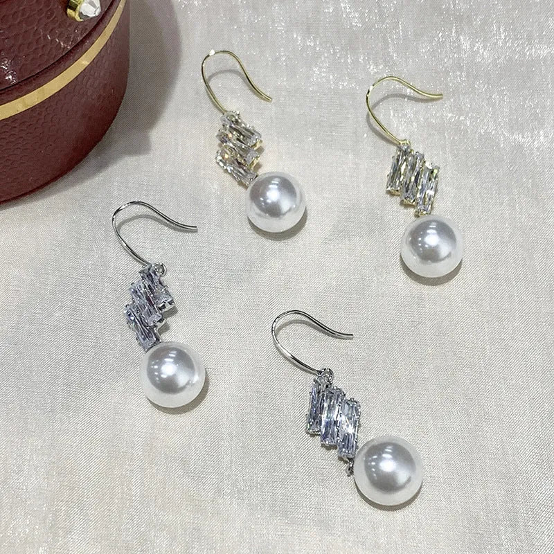 French hook earrings with pearl drop and micro inlaid sparkling diamond accent in Gold or Silvery
