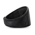Black self-heating magnetic therapy neck guard with adjustable straps on a flat surface.