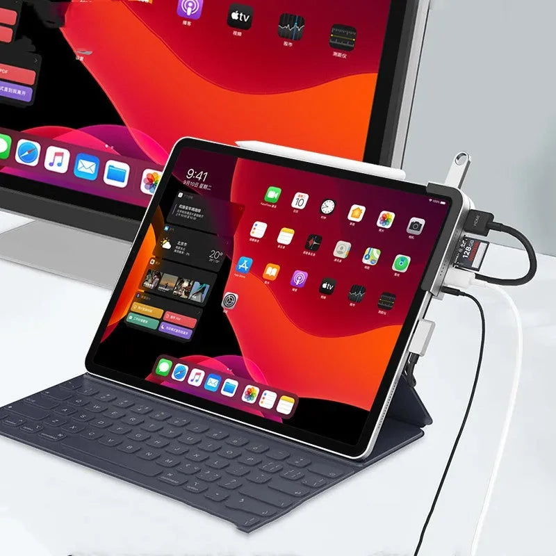 Silver aluminium grey 6-in-1 USB-C docking station for iPad Pro with HDMI and USB ports.