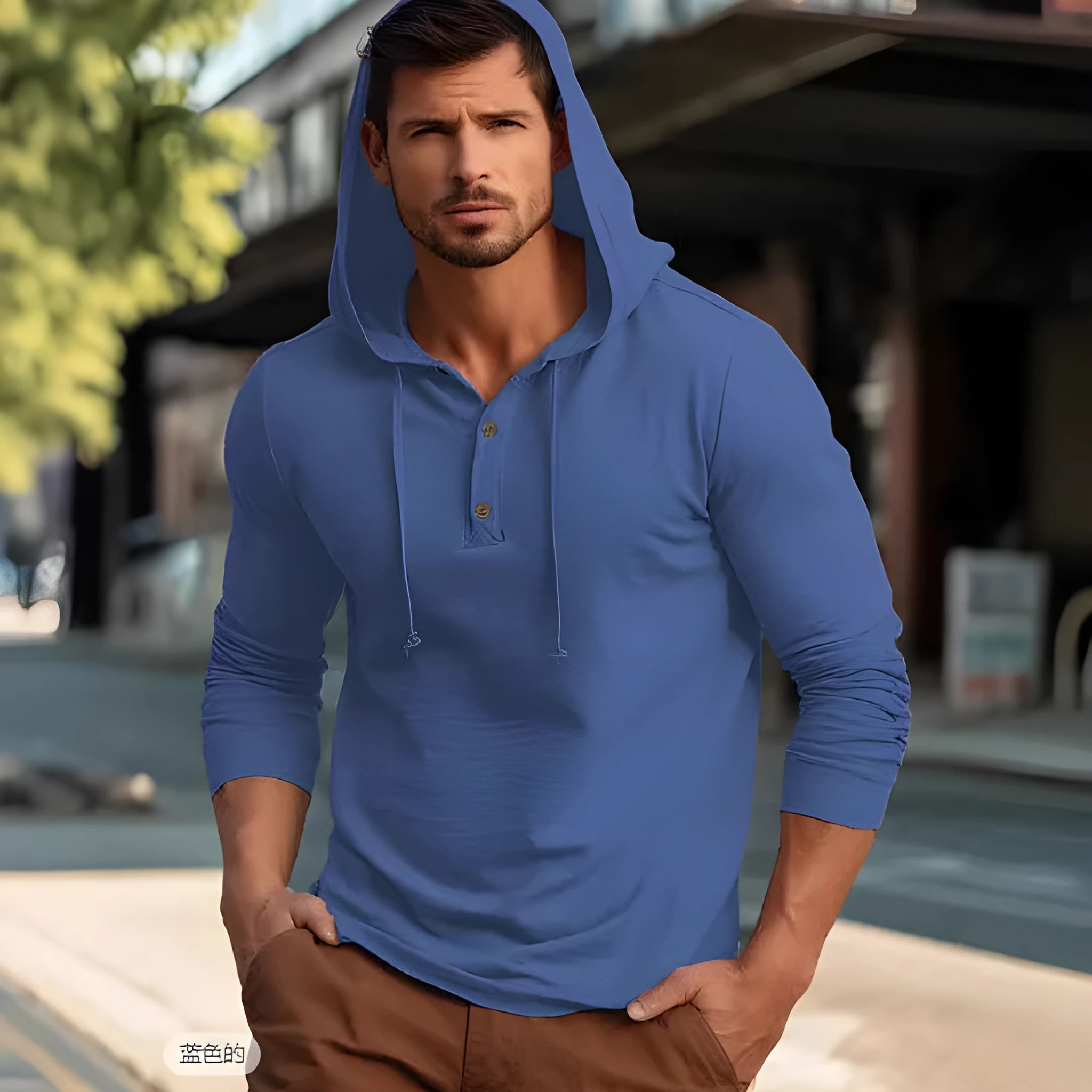 Man wearing a dark blue casual cotton hoodie pullover with long sleeves.