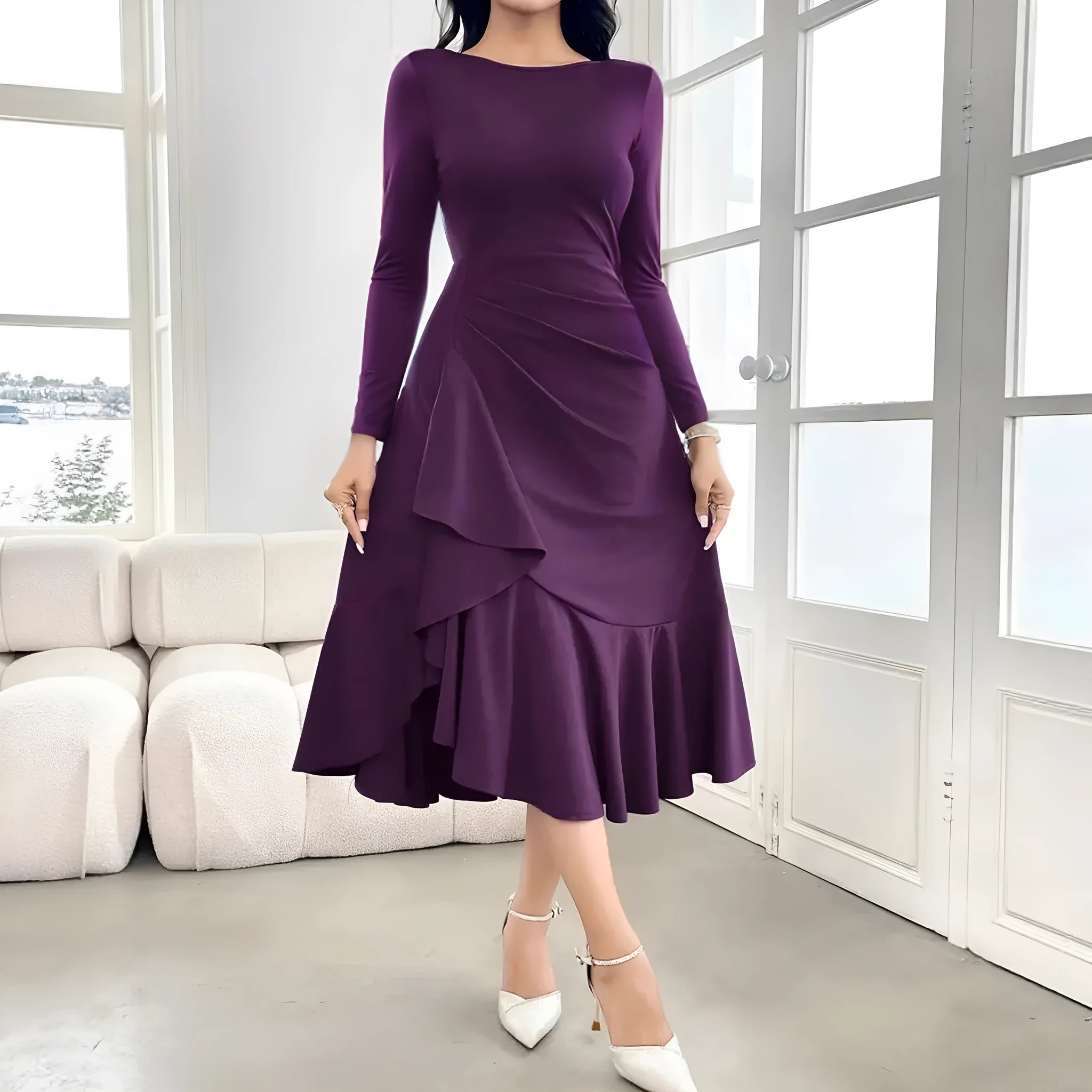 Purple women's long sleeve dress with round neck, mid waist, and ruffle details on a hanger.