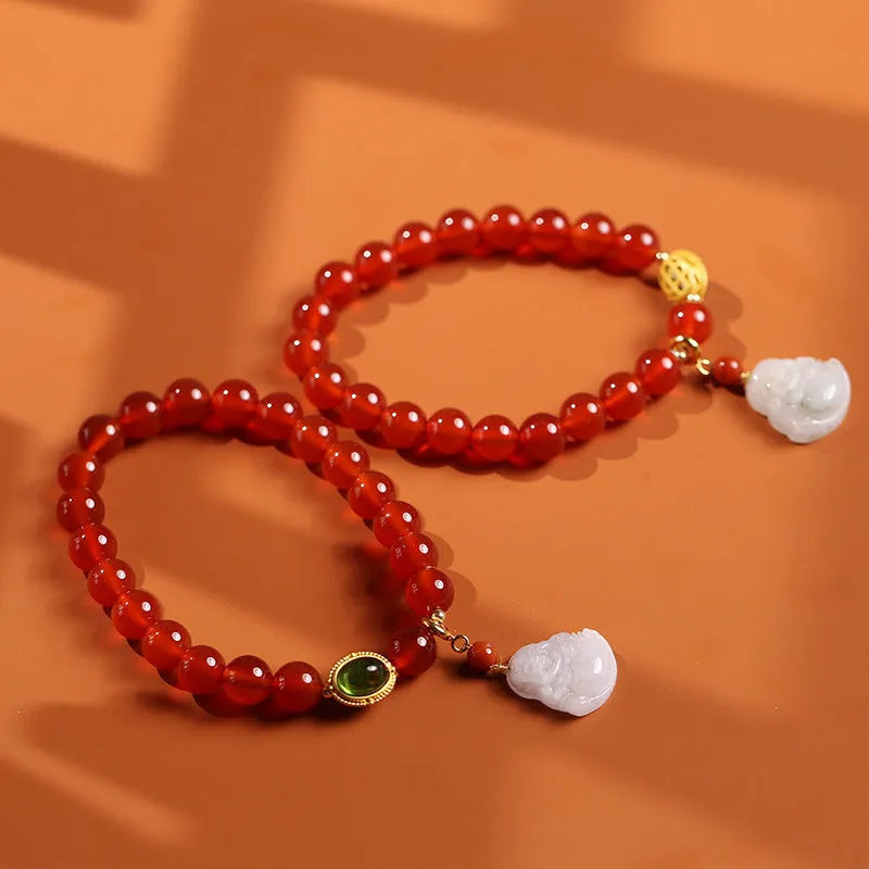 Handcrafted red agate and amber bracelet with geometric design and gold Maitreya Buddha charm