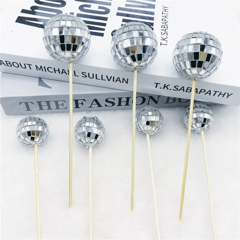 Glass disco ball cake decoration on wooden stick in various sizes from 2.5cm to 5cm diameter