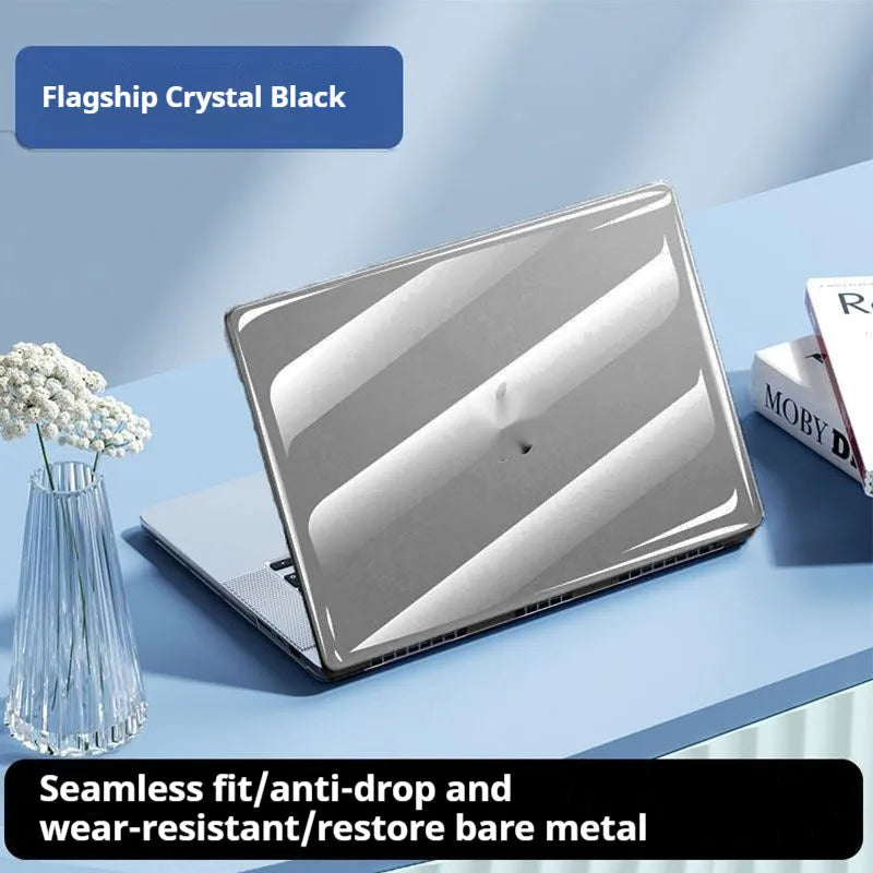 Transparent plastic protective shell case for MacBook Air and Pro laptops on a table