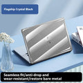 Transparent plastic protective shell case for MacBook Air and Pro laptops on a table