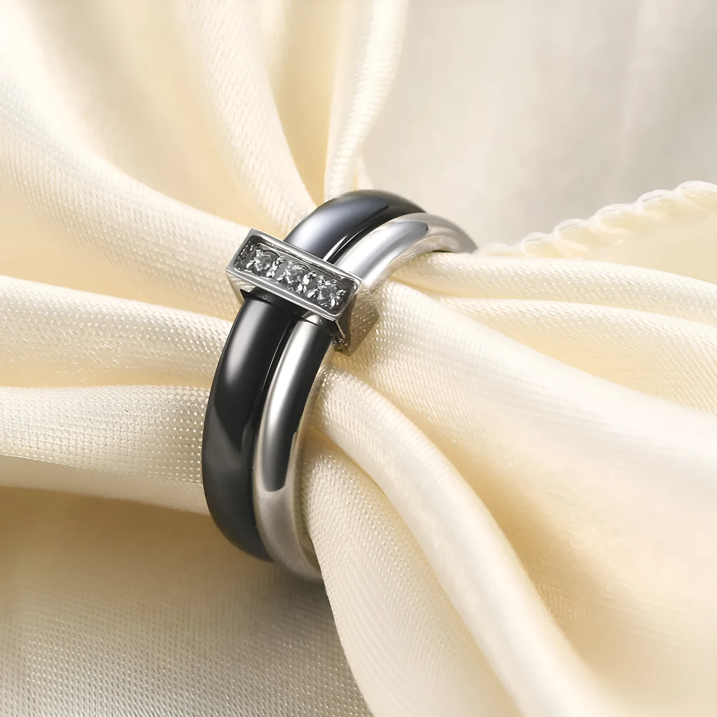 Ceramic ring with glossy stitching and inlaid zirconium in steel black or gold white colour, 6mm geometric shape