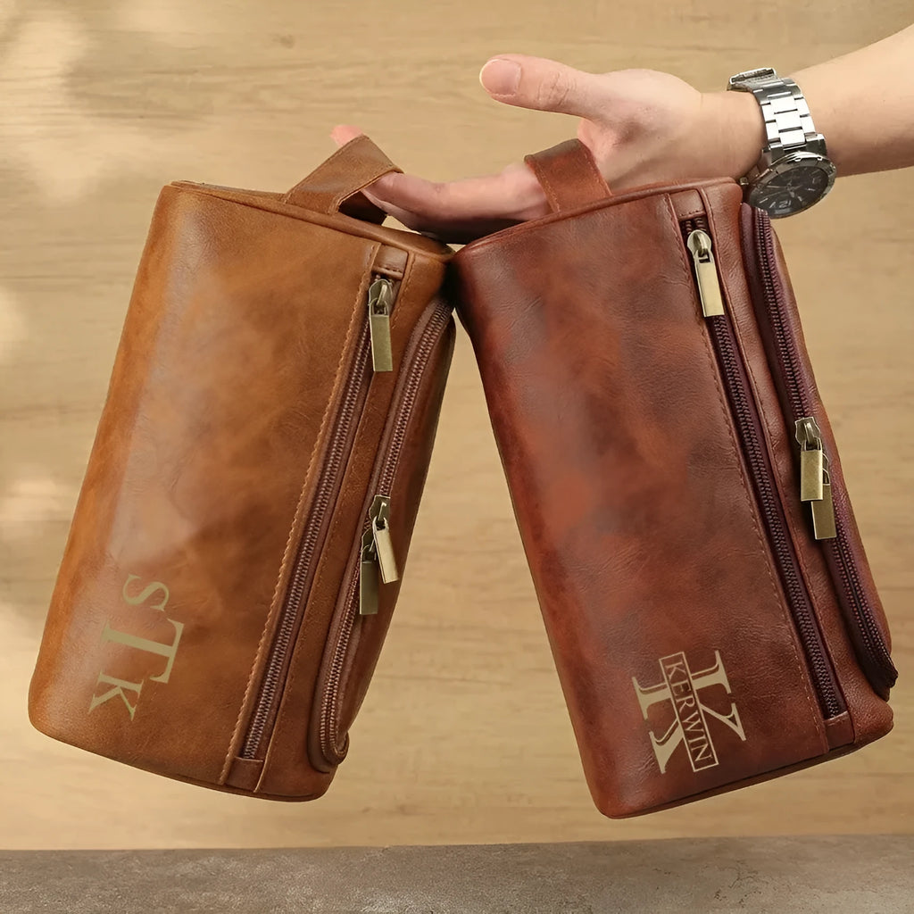 Men's black PU leather travel bag with seven compartments open, showing internal organisation