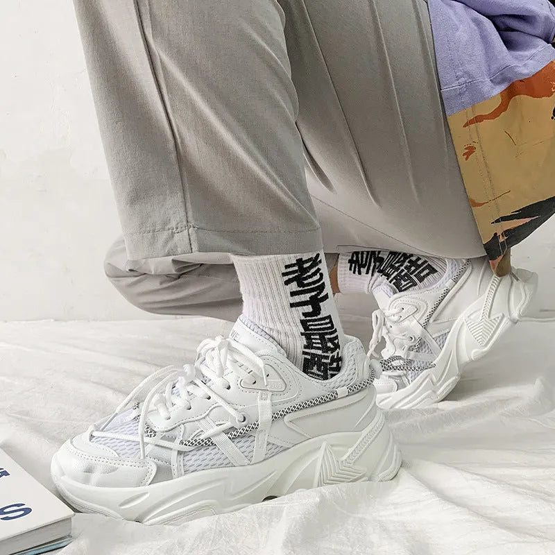 Men's white Korean-style platform dad shoes with a lace-up front on a grey background.