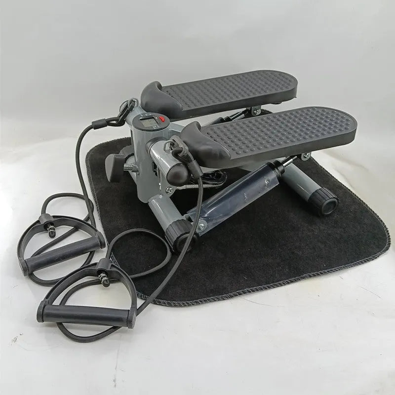 Silver grey hydraulic pedal exercise machine for home waist slimming workouts