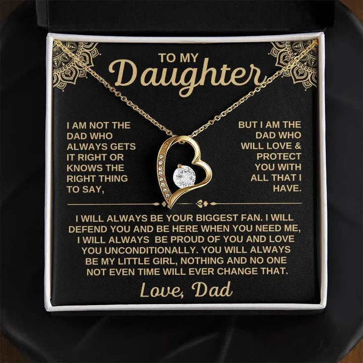 Hollow heart-shaped necklace in gold or silver finish, presented with a card and gift box.