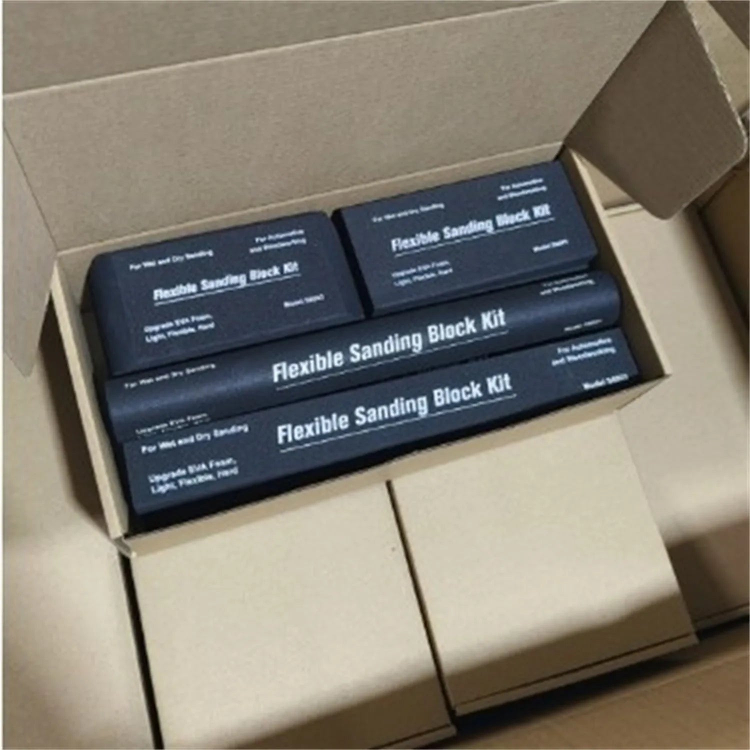 Seven black frosted EVA display blocks with metal reinforcement arranged in stacked configuration