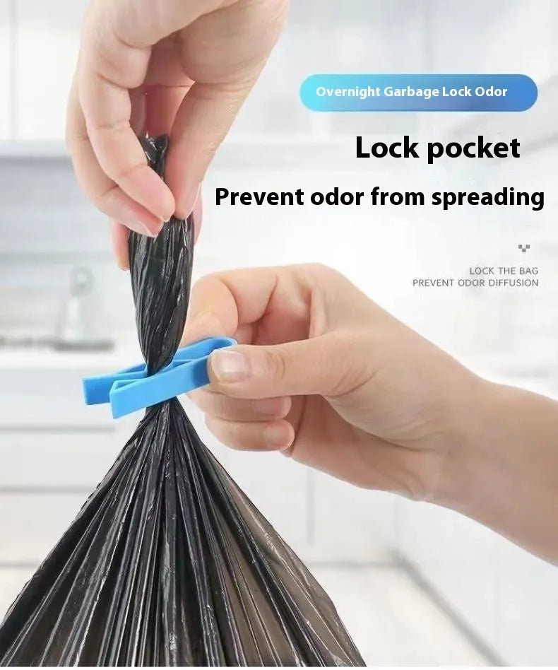 Non-slip plastic fixing clip for holding rubbish bags onto the side of a bin.