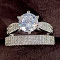 White gold colour alloy wedding ring bracelet with geometric round design