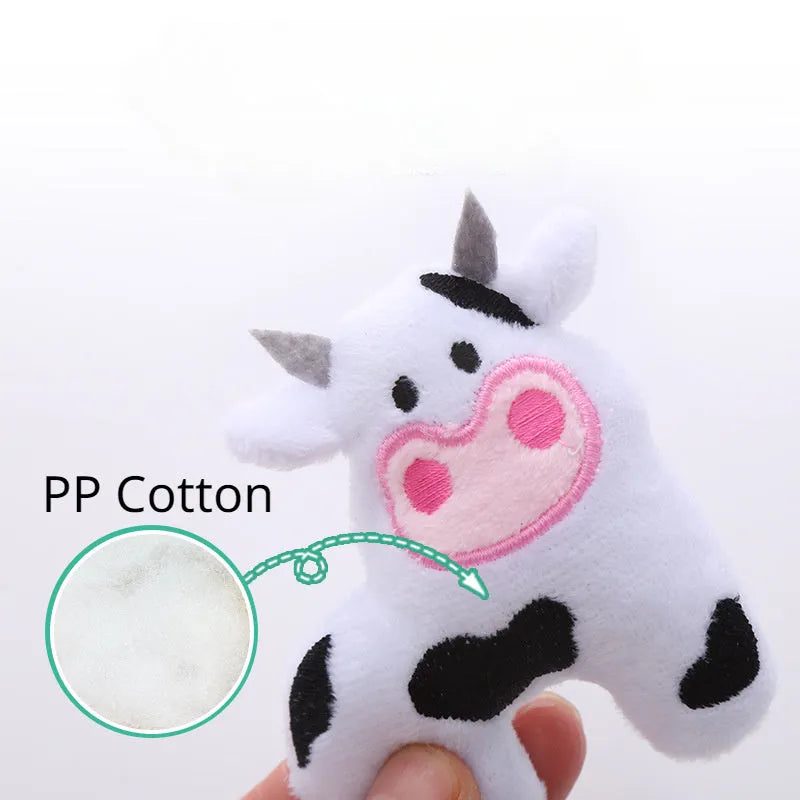 Cow shaped plush cat toy on a string handle with dangling feather, catnip inside.