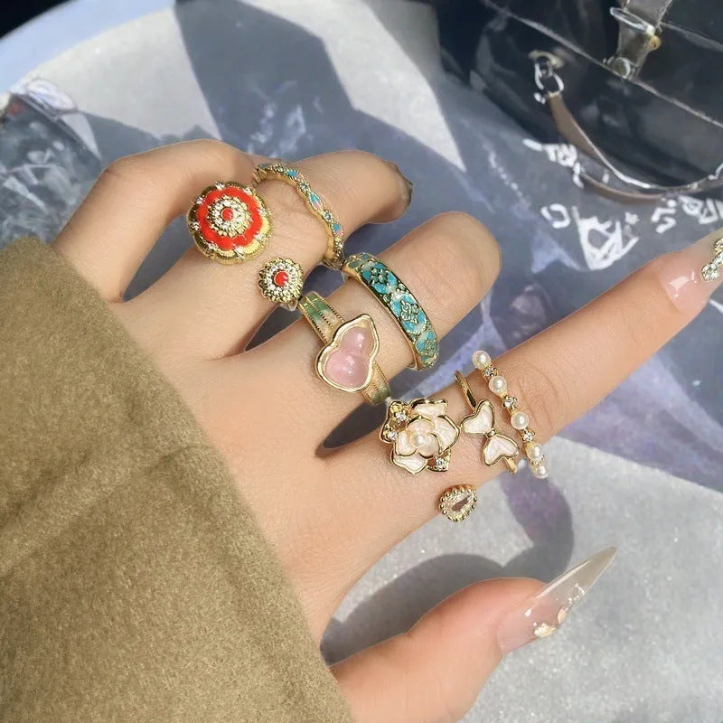 Adjustable vintage copper ring with gourd motif and inlaid zircon stones in New Chinese style.