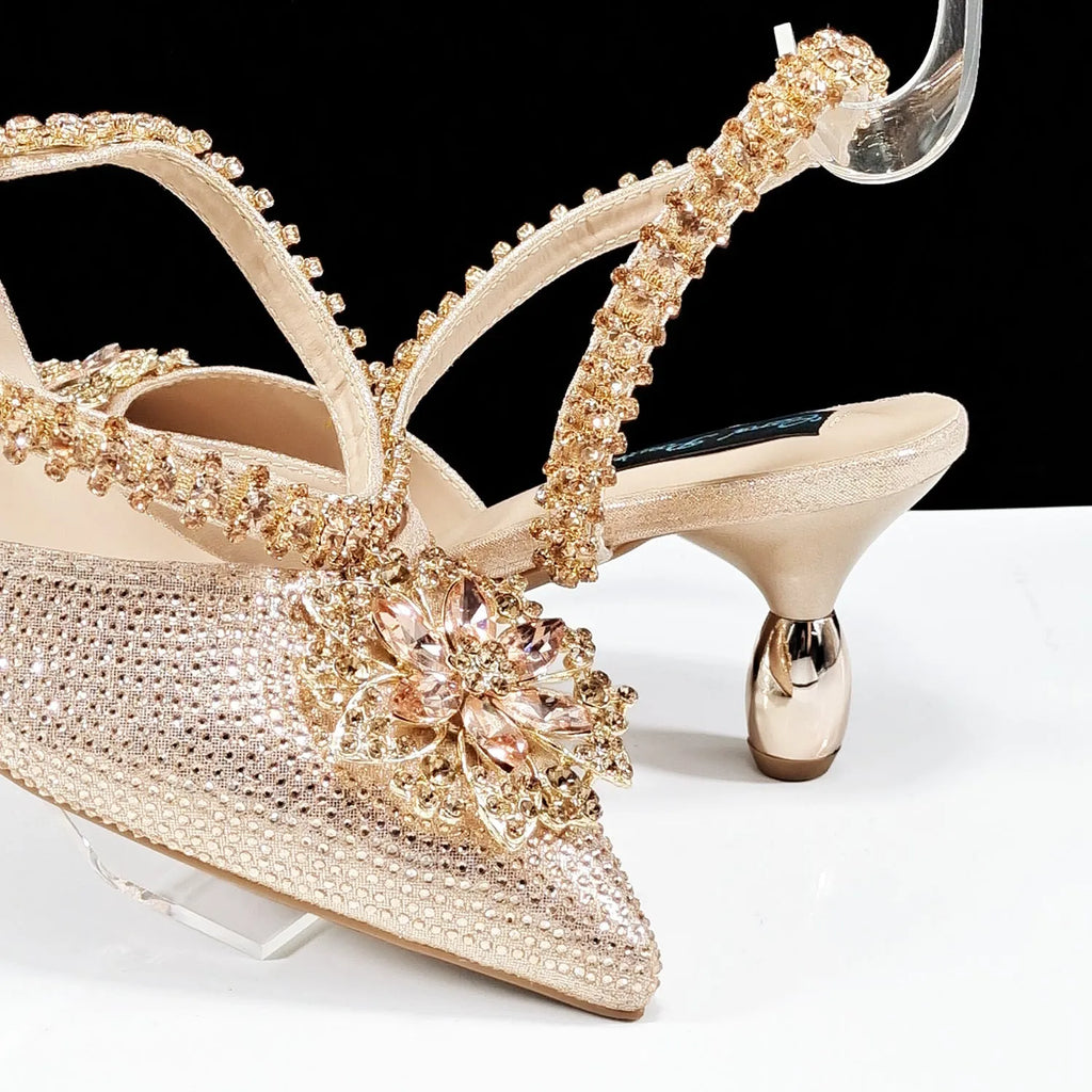 Women's black high-heel shoe and matching clutch bag set with floral drill buckle and ankle chain decoration
