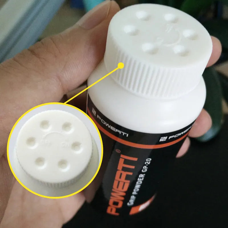 White magnesium carbonate sports anti-slip powder in a container for badminton and gym use.