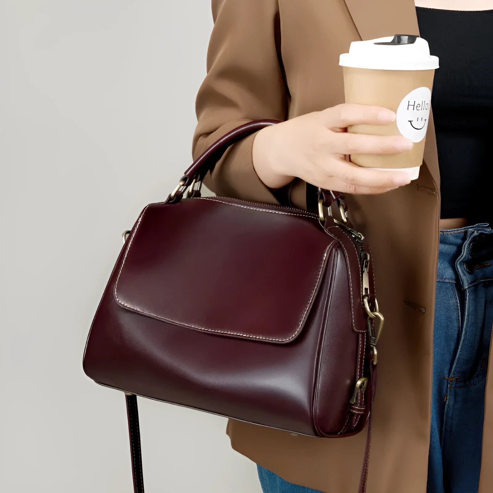 Women's soft genuine leather crossbody tote bag in a cross square shape with double straps.