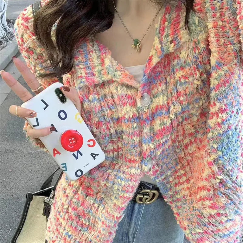 Pink or green acrylic knitted rainbow cardigan with regular sleeves and medium thickness
