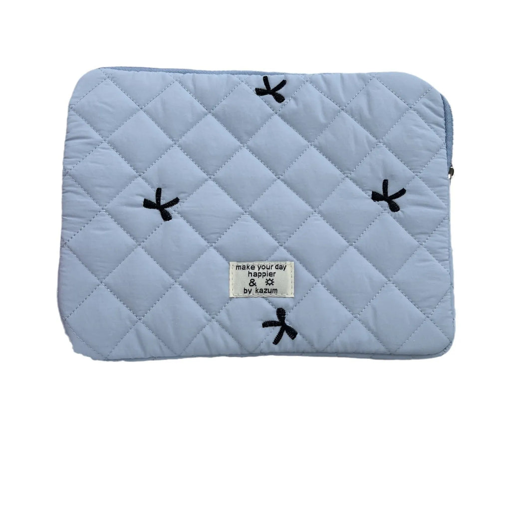Nylon laptop storage bag with rhombus embroidery and bow in light blue, showing front detail