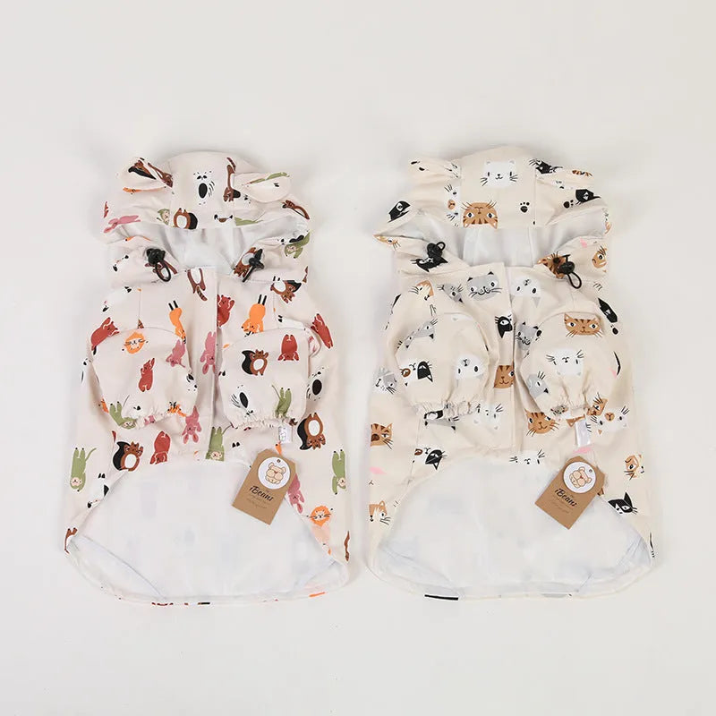 Beige cartoon print dog raincoat with double waterproof PU coating shown on a model dog.