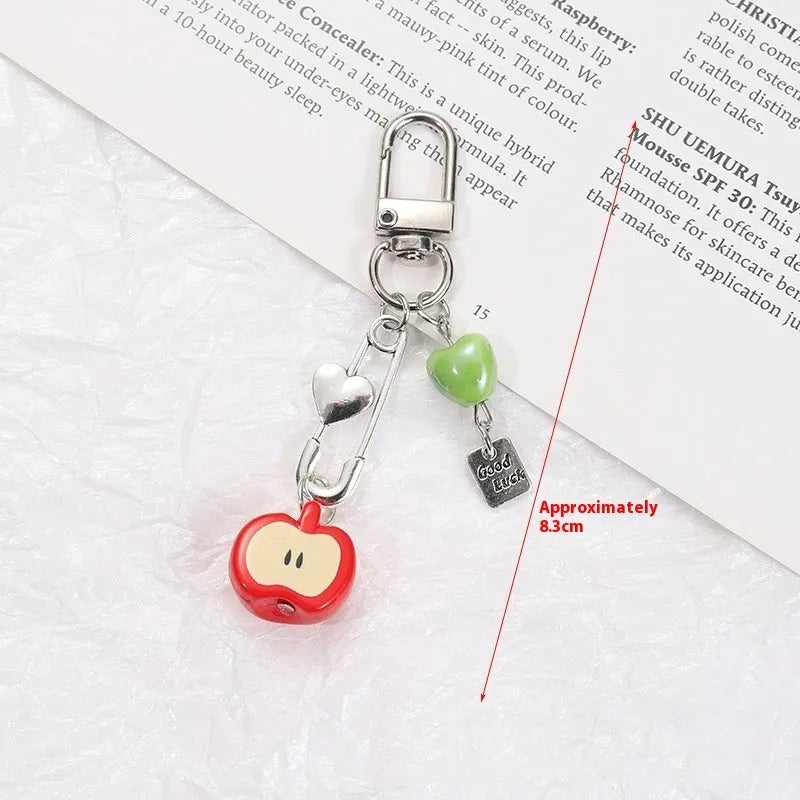 Fruit pattern mobile phone charm keychain with apple and strawberry designs in plastic resin material
