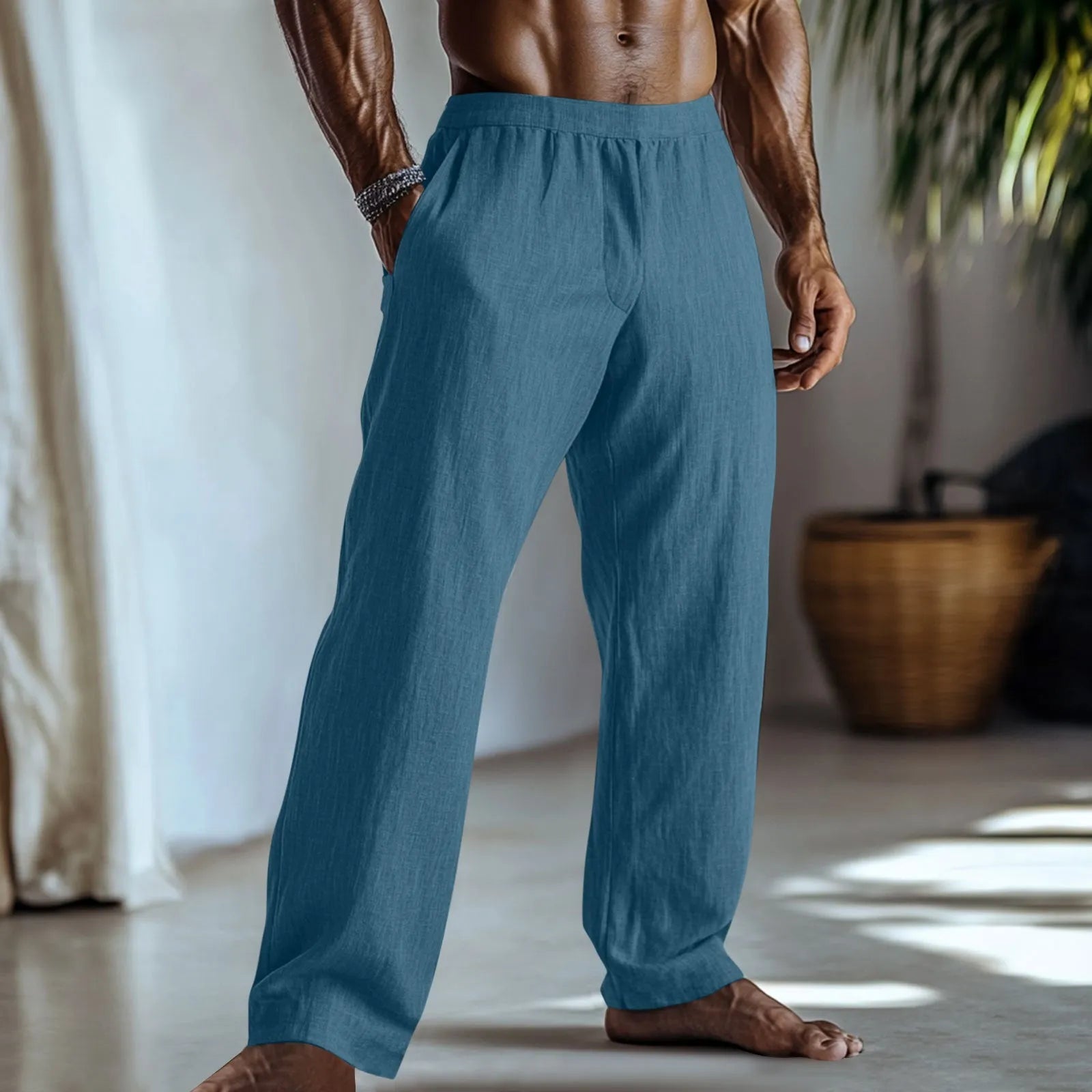 Straight leg cotton linen trousers in light green colour showing front view with pockets