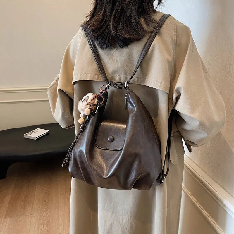 Large capacity PU leather commuter shoulder bag with mobile phone compartment in urban simplicity design