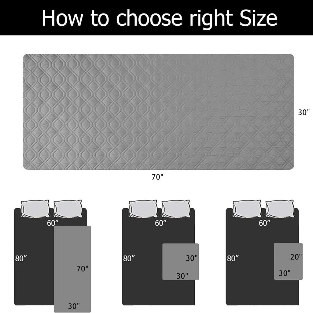 Reversible waterproof dog blanket on sofa showing two colour options with multiple size measurements