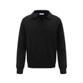 Man wearing a loose fit black pullover sweater for casual leisure wear.