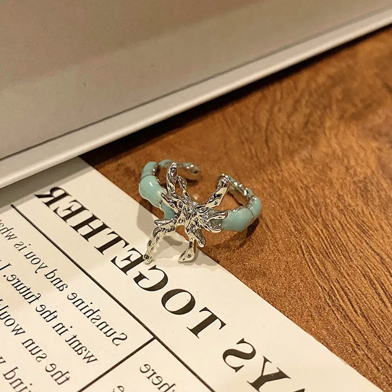 Butterfly women's copper ring with adjustable split ring design showing oil-drip colour treatment