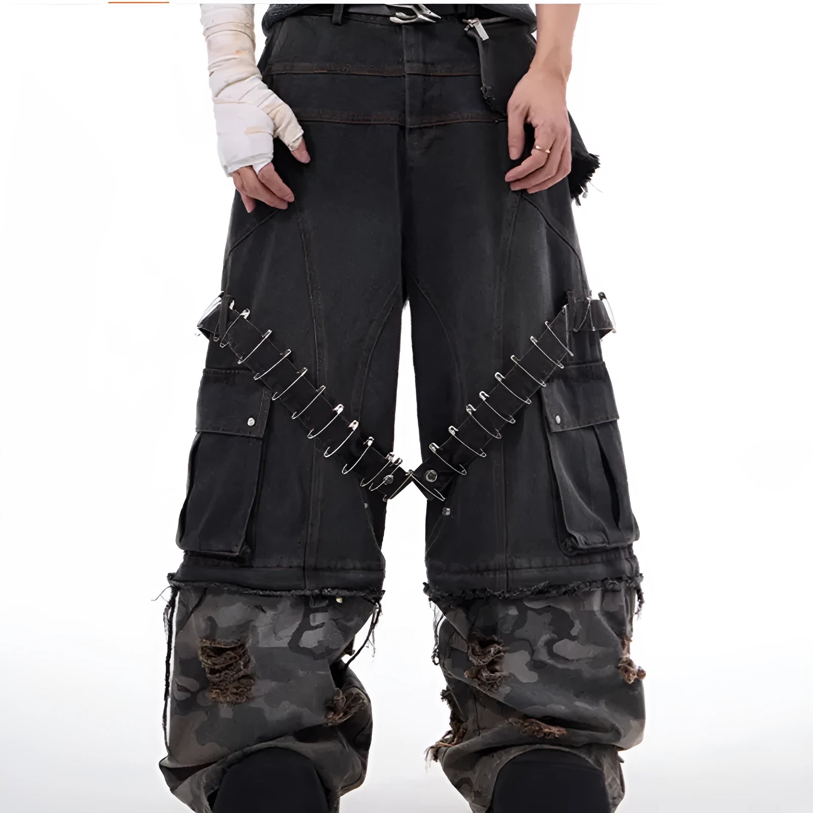 Men's grey camouflage jeans with splicing panels and ribbon detail on cotton denim.