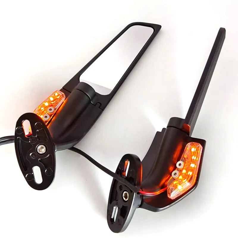 Pair of yellow-light aluminium motorcycle rearview mirrors with convex glass lenses.