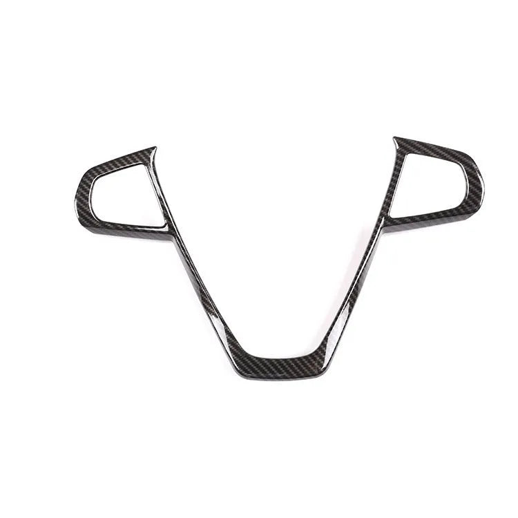 BMW steering wheel button frame decoration with black carbon fibre pattern finish.