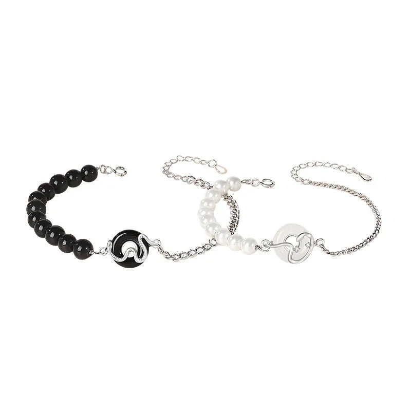 925 sterling silver couple bracelet with snake charm, obsidian pearl, and safe buckle in new Chinese style.