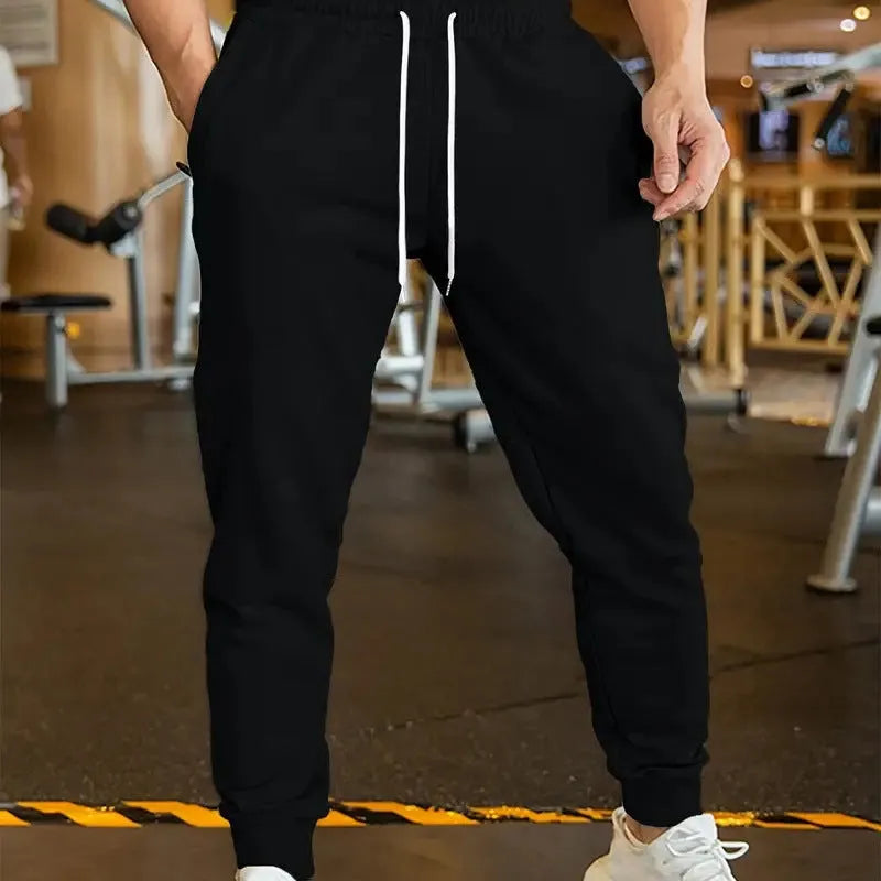 Men's linen style leisure trousers with elastic drawstring waist in loose fit cut