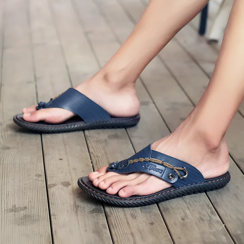 Men's black casual slippers with a non-slip sole and PU leather upper.