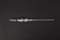 Transparent glass crystal pen with coloured ink visible inside, abstract modelling design