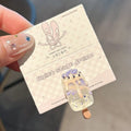 Close-up of a resin hair clip with a cartoon ice cream design in a choice of five colours.