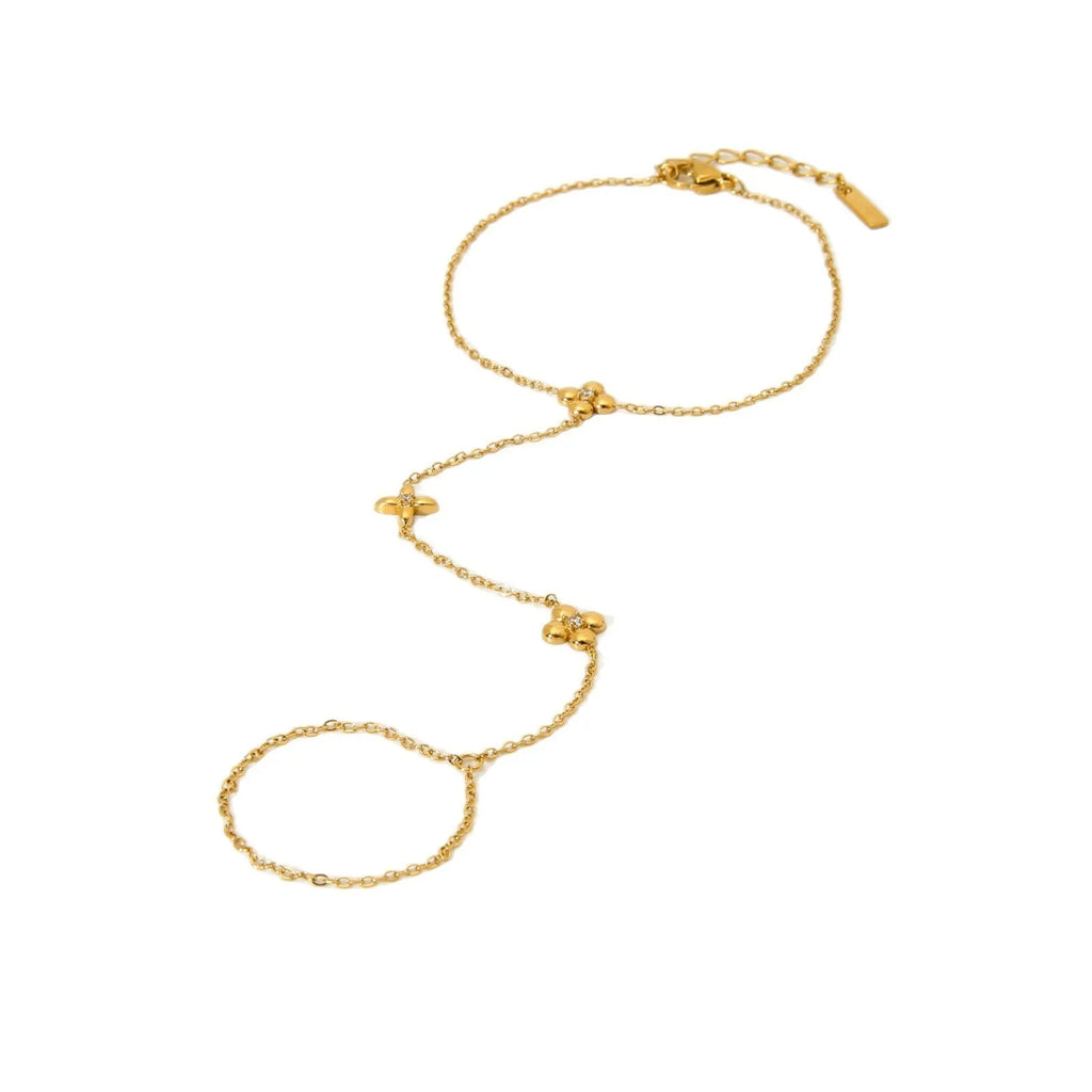 Women's gold stainless steel bracelet with geometric eight-pointed star and flower designs